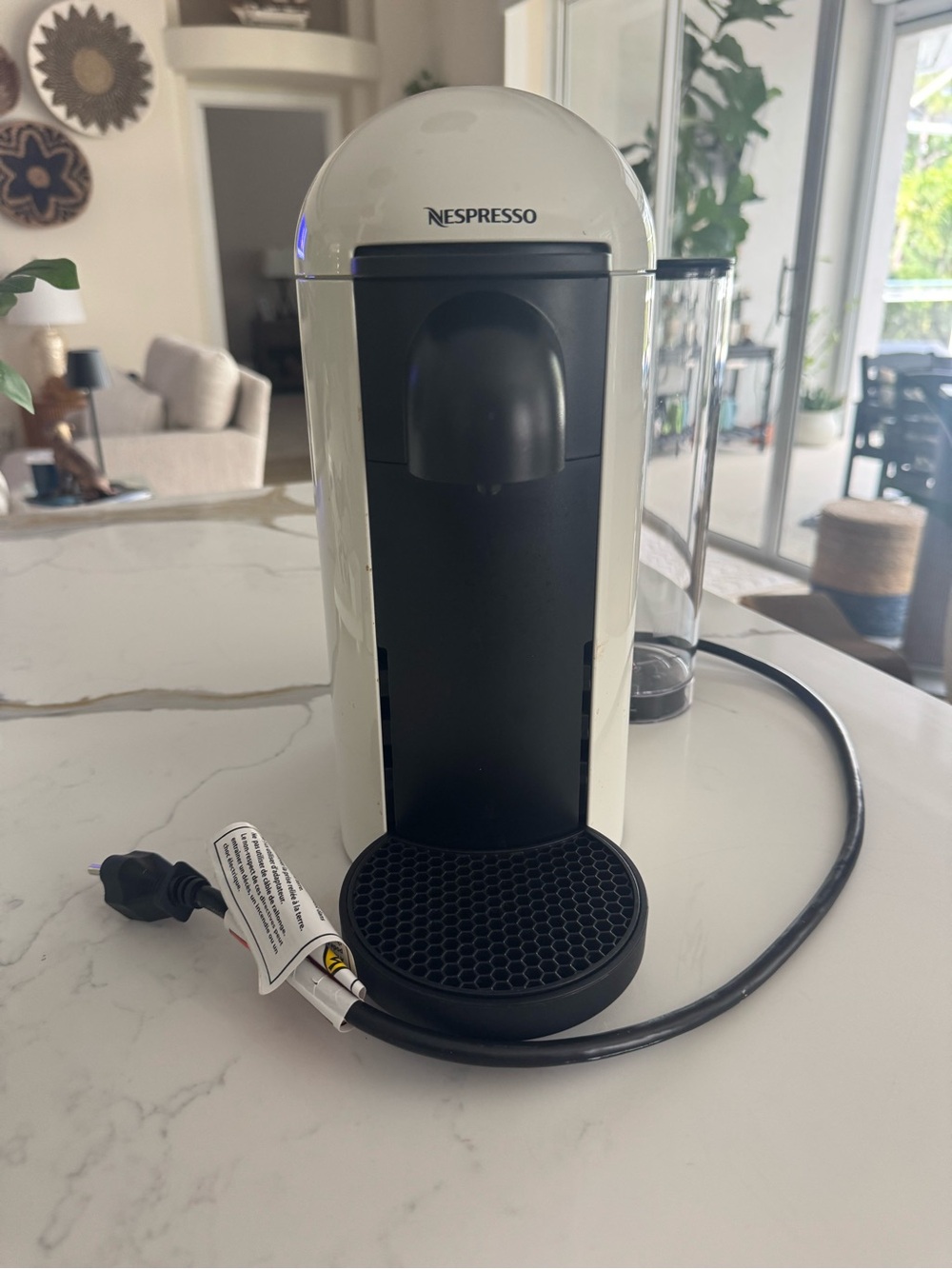 Nespresso Vertuo Plus Machine in White and Black. Used a few months.